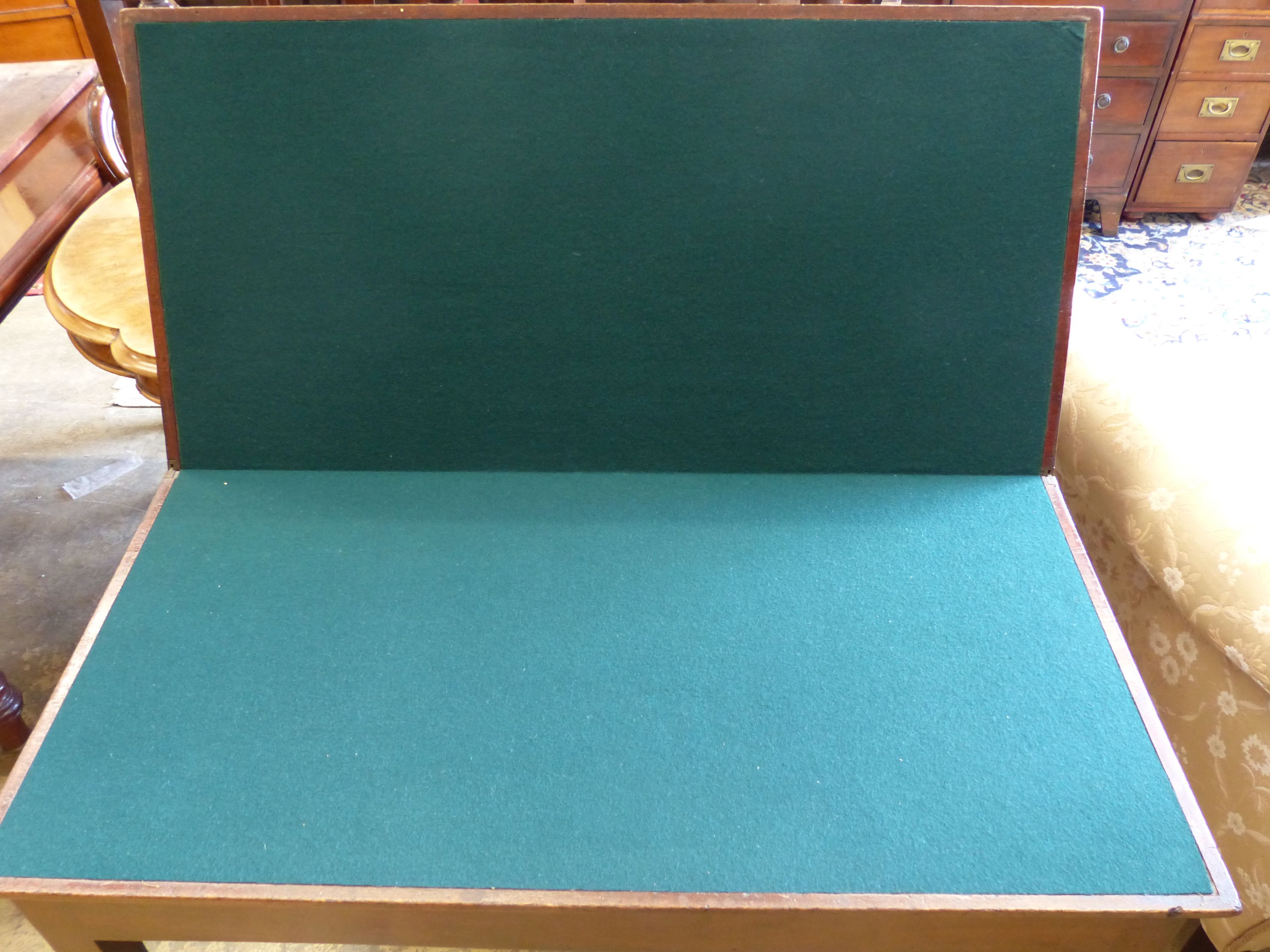 A George III rectangular mahogany folding card table, height 73cm, width 92cm, depth 45cm